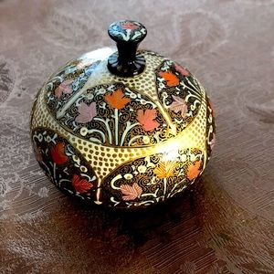 Intricate handmade and painted candy or ornate ornament dish.